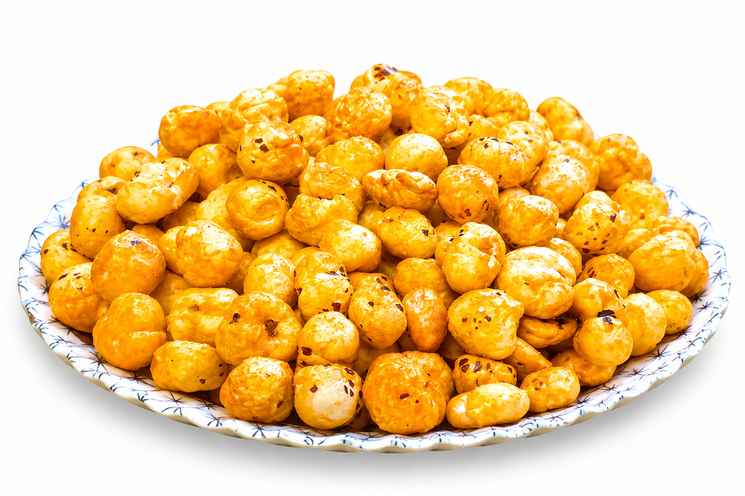 Cheese and herbs roasted makhana fox nuts piled on a patterned ceramic plate