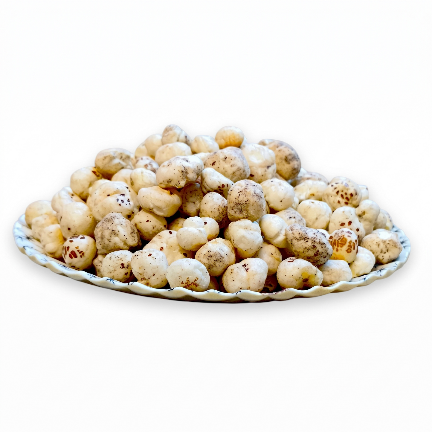Side view of a plate of crunchy Himalayan pink salt roasted makhana