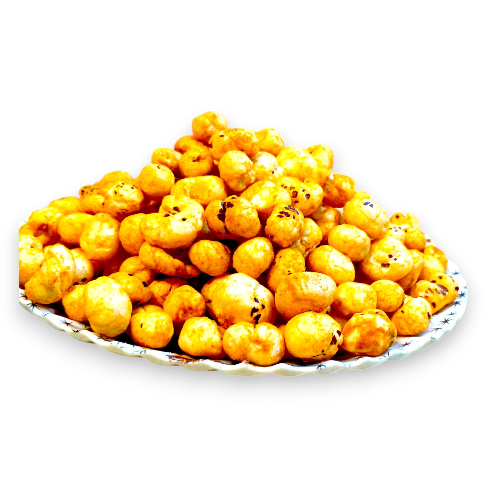 Tangy tomato roasted makhana fox nuts piled on a patterned ceramic plate